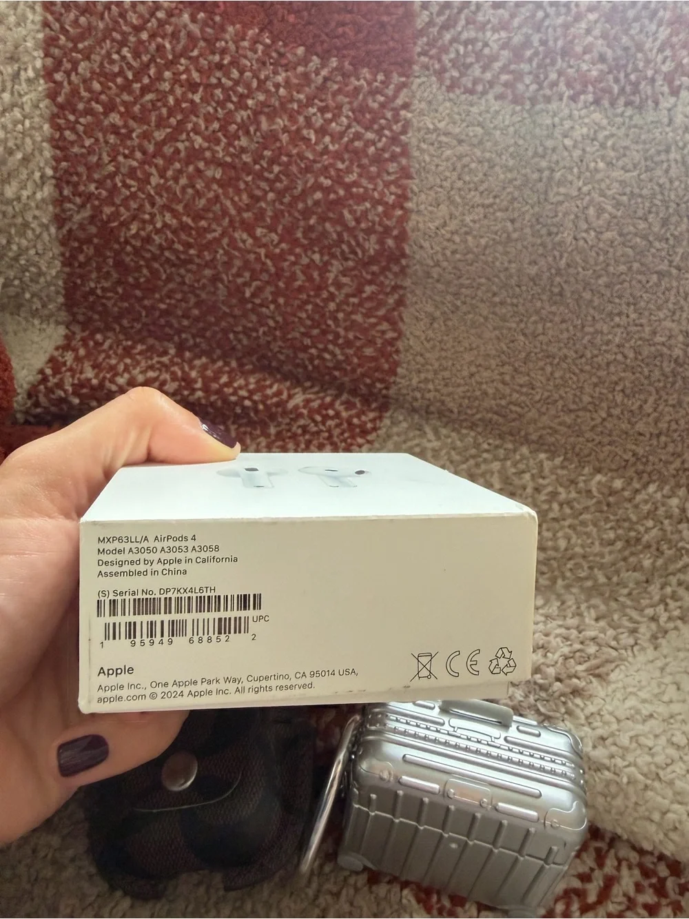 Apple AirPods 4 with two protective cases bundle